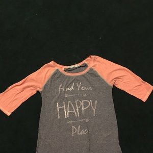 Woman’s 3/4 sleeve t shirt.